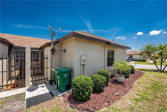 13100 S Mccall Rd Unit 112, Port Charlotte, FL 33981 - view of home's exterior featuring stucco siding