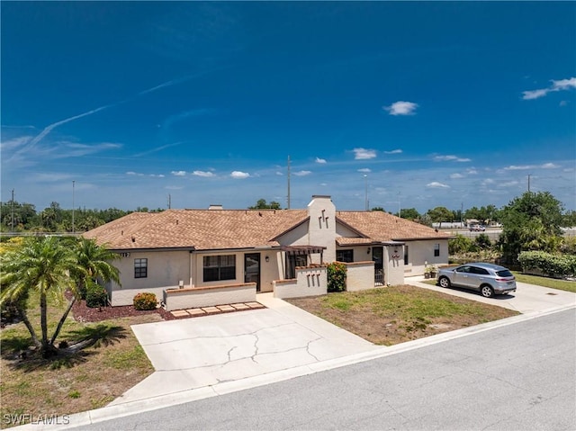 13100 S Mccall Rd Unit 112, Port Charlotte, FL 33981 - single story home featuring stucco siding and concrete driveway