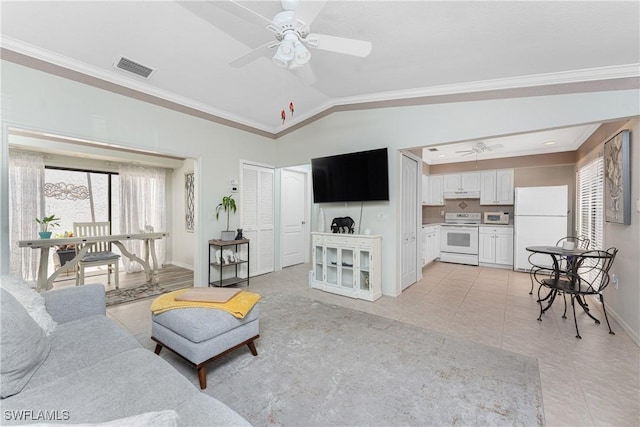 13100 S Mccall Rd Unit 112, Port Charlotte, FL 33981 - living area featuring crown molding, vaulted ceiling, a ceiling fan, and light tile patterned floors