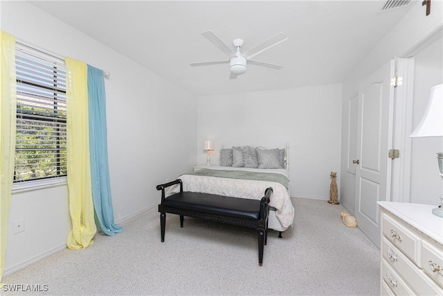13100 S Mccall Rd Unit 112, Port Charlotte, FL 33981 - carpeted bedroom featuring a ceiling fan and baseboards