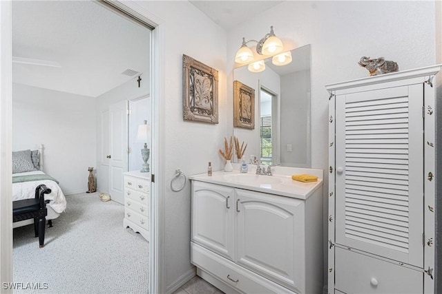 13100 S Mccall Rd Unit 112, Port Charlotte, FL 33981 - ensuite bathroom with vanity and baseboards