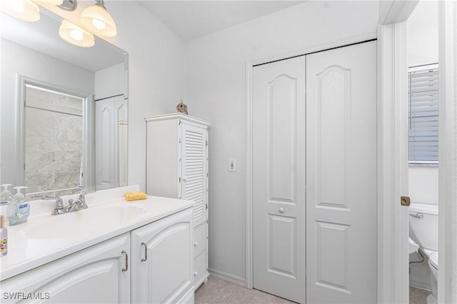 13100 S Mccall Rd Unit 112, Port Charlotte, FL 33981 - bathroom with a closet, vanity, and tile patterned flooring