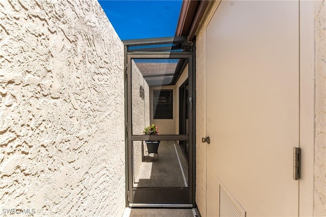 13100 S Mccall Rd Unit 112, Port Charlotte, FL 33981 - property entrance with stucco siding