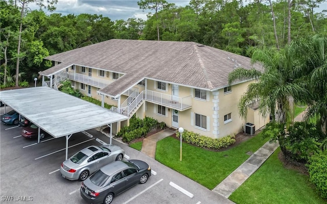 3451 County Barn Rd Unit G103, Naples, FL 34112 - view of property with uncovered parking