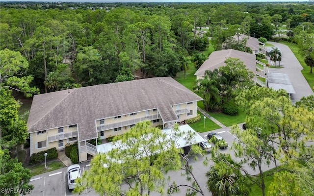 3451 County Barn Rd Unit G103, Naples, FL 34112 - view from above of property featuring a forest