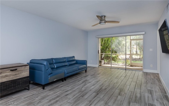 3451 County Barn Rd Unit G103, Naples, FL 34112 - living room featuring wood finished floors and a ceiling fan