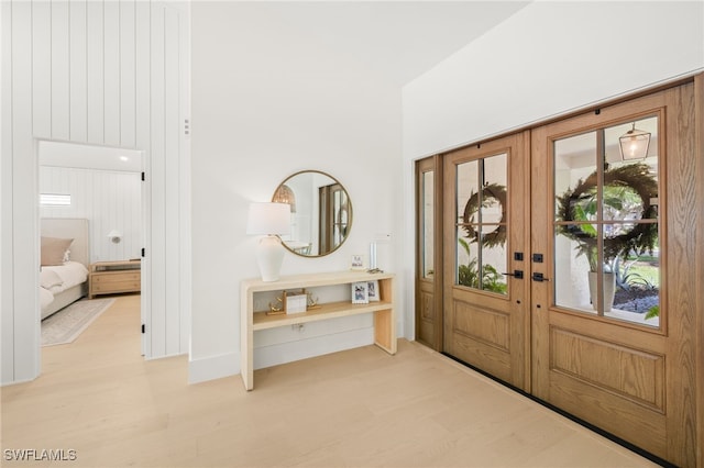 7658 Ponte Verde Way, Naples, FL 34109 - entryway featuring wood finished floors and french doors