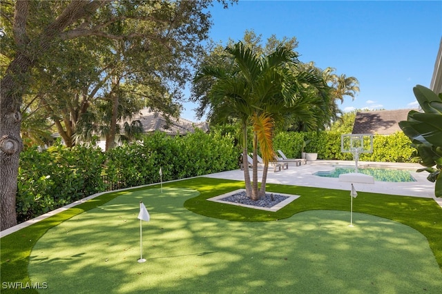 7658 Ponte Verde Way, Naples, FL 34109 - view of home's community with a putting green, a patio, and a pool