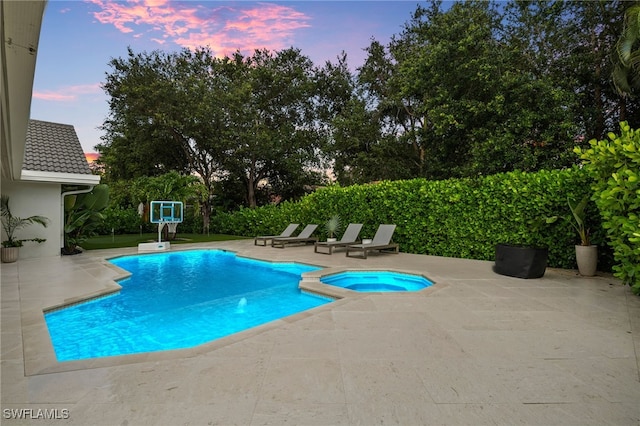7658 Ponte Verde Way, Naples, FL 34109 - view of swimming pool with a patio and a pool with connected hot tub