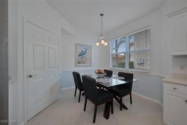 3993 Bishopwood Ct E Unit 101, Naples, FL 34114 - dining room with a chandelier and light tile patterned floors