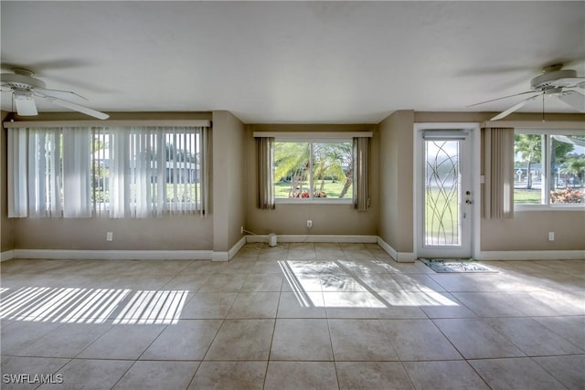 5549 Westwind Ln, Fort Myers, FL 33919 - unfurnished room featuring a ceiling fan, plenty of natural light, and tile patterned flooring
