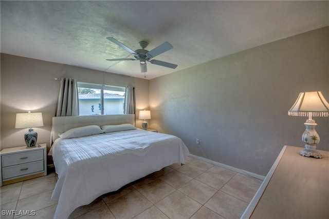 5549 Westwind Ln, Fort Myers, FL 33919 - bedroom with light tile patterned flooring and ceiling fan
