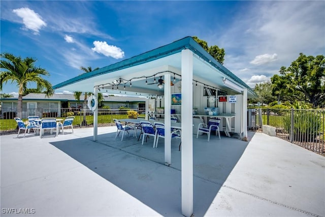 5549 Westwind Ln, Fort Myers, FL 33919 - view of patio / terrace with a gazebo and outdoor dining area
