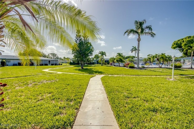 5549 Westwind Ln, Fort Myers, FL 33919 - view of home's community featuring a lawn
