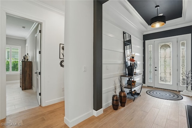17467 Caravita Ln, Fort Myers, FL 33913 - foyer featuring light wood-style flooring and ornamental molding