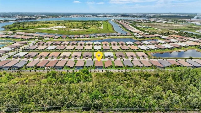 17467 Caravita Ln, Fort Myers, FL 33913 - aerial view of residential area with a large body of water
