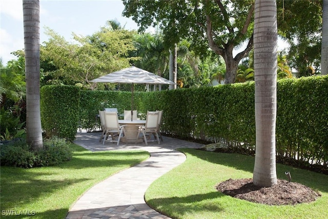 960 7th St S Unit 202, Naples, FL 34102 - view of yard with a patio area