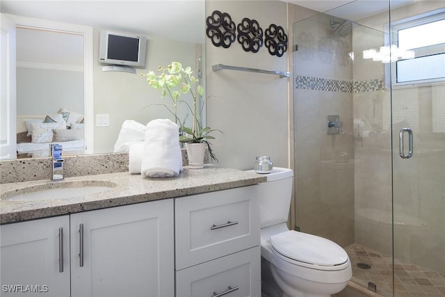 960 7th St S Unit 202, Naples, FL 34102 - bathroom with a shower stall, vanity, and ornamental molding