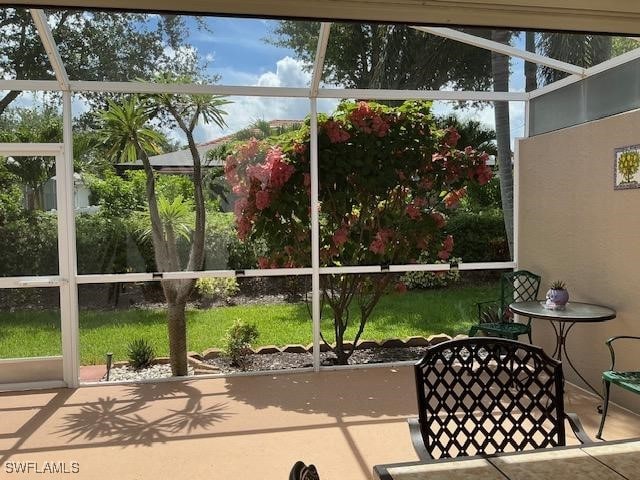 8187 Ibis Cove Cir Unit A113, Naples, FL 34119 - view of sunroom / solarium
