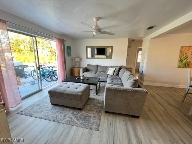 1661 Coronado Rd, Fort Myers, FL 33901 - living area featuring a ceiling fan and wood finished floors