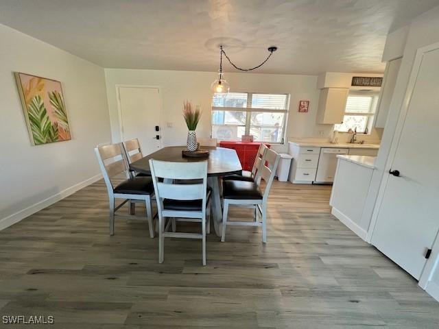 1661 Coronado Rd, Fort Myers, FL 33901 - dining space featuring light wood finished floors