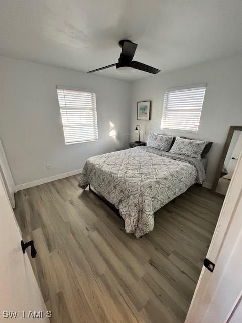 1661 Coronado Rd, Fort Myers, FL 33901 - bedroom with wood finished floors and ceiling fan