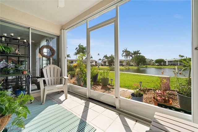 7152 Blanquilla Ct Unit 5, Fort Myers, FL 33908 - sunroom / solarium with a water view and tile patterned flooring