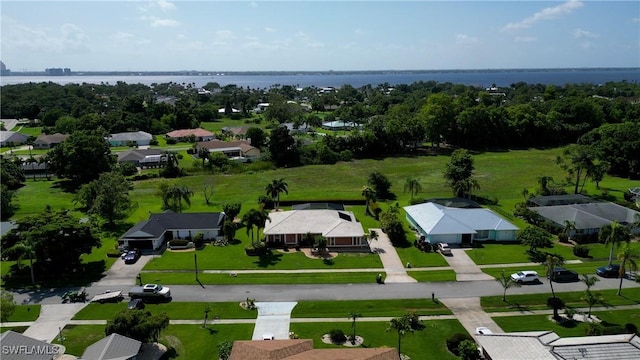 4180 Prestwick Ct, North Fort Myers, FL 33903 - aerial perspective of suburban area with a large body of water