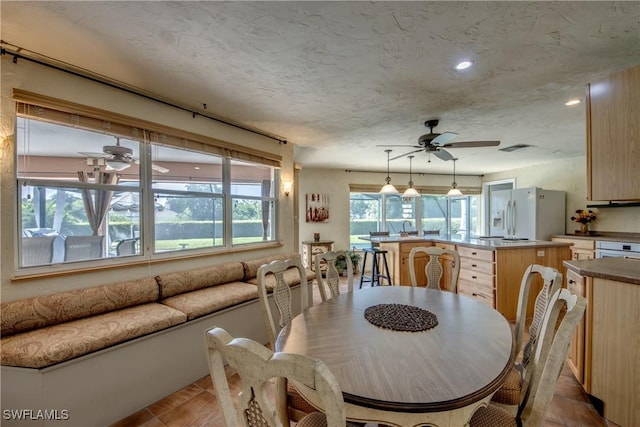 4180 Prestwick Ct, North Fort Myers, FL 33903 - dining room featuring ceiling fan
