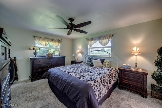 4180 Prestwick Ct, North Fort Myers, FL 33903 - bedroom with carpet floors, multiple windows, and ceiling fan