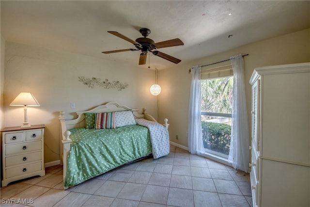 4180 Prestwick Ct, North Fort Myers, FL 33903 - tiled bedroom with a ceiling fan and baseboards