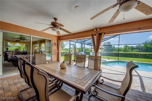 4180 Prestwick Ct, North Fort Myers, FL 33903 - sunroom with a ceiling fan and outdoor dining space