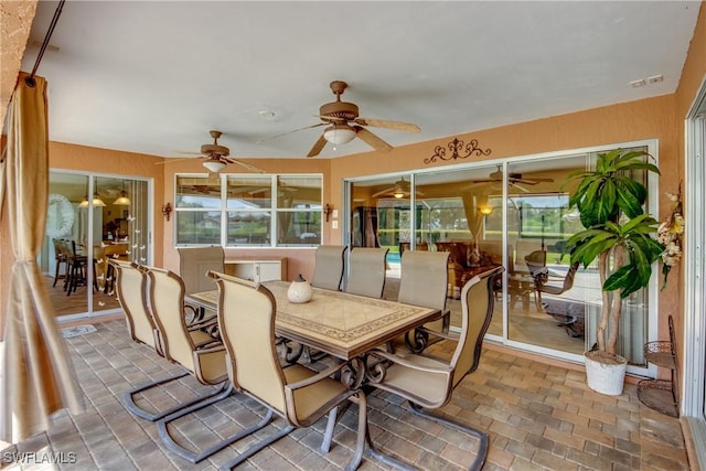 4180 Prestwick Ct, North Fort Myers, FL 33903 - sunroom / solarium with ceiling fan and outdoor dining area