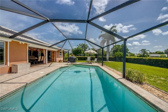 4180 Prestwick Ct, North Fort Myers, FL 33903 - outdoor pool with a lawn, a ceiling fan, and a patio