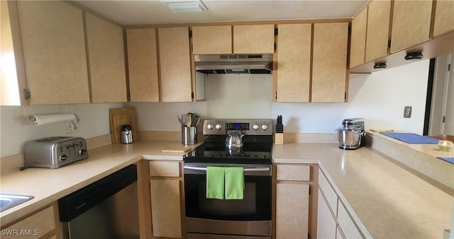 4213 SE 19th Ave Unit 208, Cape Coral, FL 33904 - kitchen with appliances with stainless steel finishes, under cabinet range hood, and light countertops