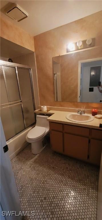 4213 SE 19th Ave Unit 208, Cape Coral, FL 33904 - bathroom with vanity, combined bath / shower with glass door, and tile patterned flooring