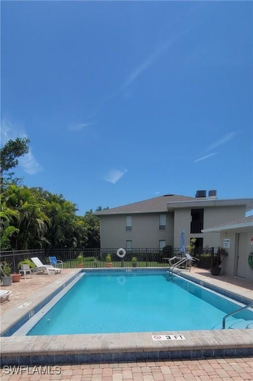 4213 SE 19th Ave Unit 208, Cape Coral, FL 33904 - community pool featuring a patio