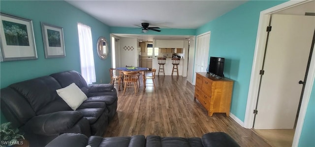 4213 SE 19th Ave Unit 208, Cape Coral, FL 33904 - living area featuring wood finished floors and ceiling fan
