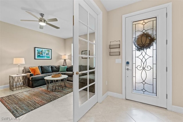 4012 E Hampton Cir, Alva, FL 33920 - tiled foyer entrance featuring baseboards and a ceiling fan