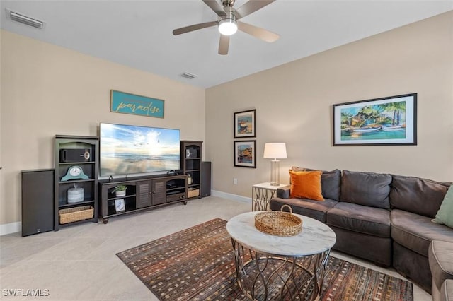 4012 E Hampton Cir, Alva, FL 33920 - living room with ceiling fan and light tile patterned floors