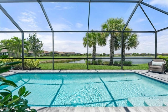 4012 E Hampton Cir, Alva, FL 33920 - outdoor pool featuring glass enclosure, a water view, and a patio