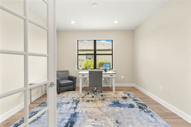 20676 Napa Loop, Estero, FL 33928 - home office featuring light wood finished floors and baseboards