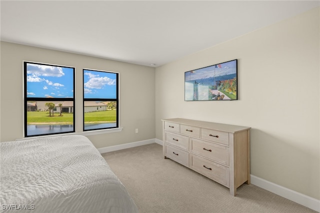 20676 Napa Loop, Estero, FL 33928 - bedroom featuring light colored carpet and baseboards