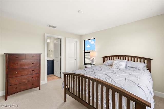 20676 Napa Loop, Estero, FL 33928 - bedroom featuring light carpet and ensuite bath