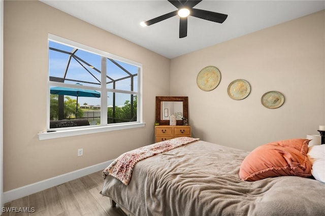 42274 Waterfront Way, Punta Gorda, FL 33982 - bedroom with wood finished floors and a ceiling fan