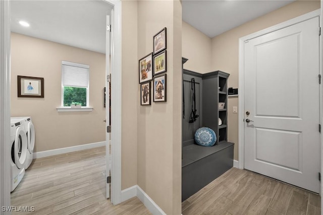 42274 Waterfront Way, Punta Gorda, FL 33982 - mudroom featuring washing machine and clothes dryer, light wood-type flooring, and recessed lighting