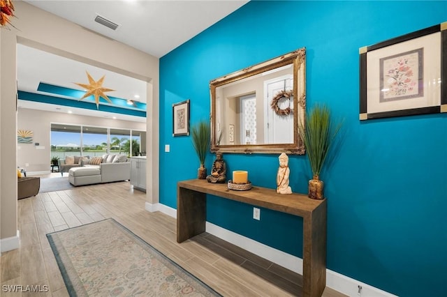 42274 Waterfront Way, Punta Gorda, FL 33982 - corridor featuring wood finished floors and baseboards
