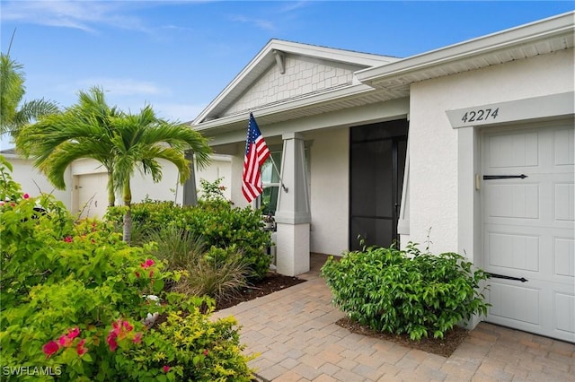 42274 Waterfront Way, Punta Gorda, FL 33982 - entrance to property with stucco siding