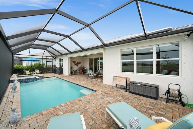 42274 Waterfront Way, Punta Gorda, FL 33982 - view of pool featuring a patio area, a pool with connected hot tub, a lanai, and ceiling fan