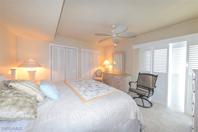 7000 Estero Blvd Unit 205, Fort Myers Beach, FL 33931 - carpeted bedroom featuring multiple closets and a ceiling fan